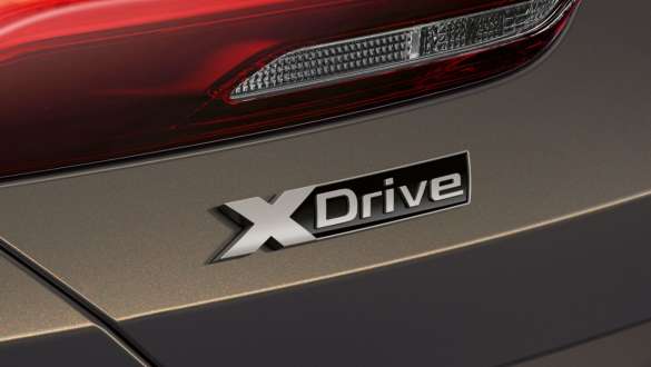 BMW M850i xDrive Dravitgrau metallic, logo xDrive G14. BMW M850i xDrive Dravitgrau metallic, logo xDrive G14.