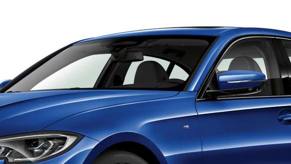BMW 3 Reeks Berline, BMW akoestisch glas G20. Driekwart zijaanzicht van de BMW 3 Reeks Berline met focus op de voorruit en zijruit aan bestuurderszijde met akoestisch glas G20.
