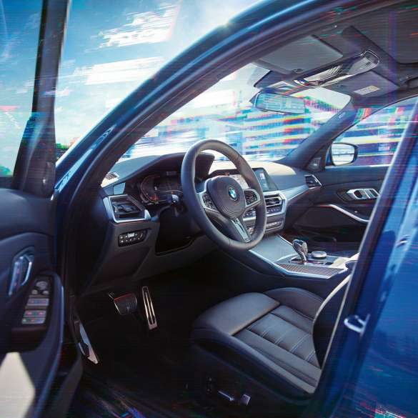 BMW 3 Reeks Berline, interieur G20. Close-up van de bestuurdersplaats in het interieur van de BMW 3 Reeks Berline G20.