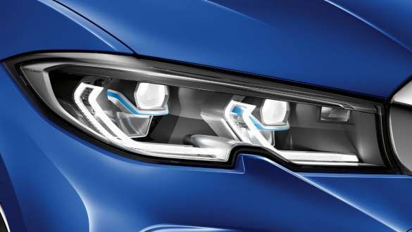 BMW 3 Reeks Berline (G20), BMW Laserlight. BMW 3 Reeks Berline (G20), BMW Laserlight. Zijdelingse close-up van de linker koplamp met BMW Laserlight.