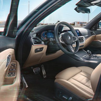 BMW 3 Reeks Touring, detailaanzicht van de cockpit G21 BMW 3 Reeks Touring, detailaanzicht van de cockpit met stedelijke achtergrond G21