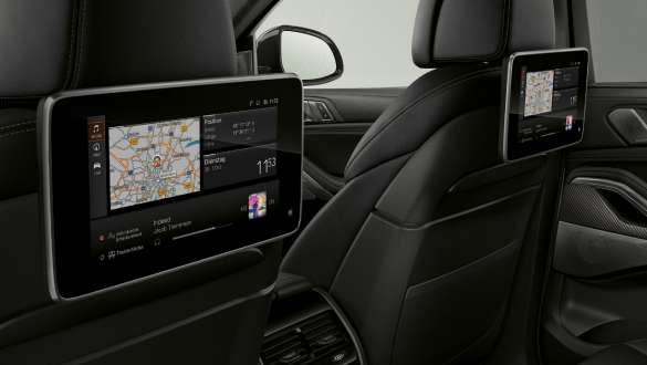 Entertainmentsysteem Professional achteraan G06. Close-up van het BMW interieur met focus op het entertainmentsysteem Professional achteraan G06.