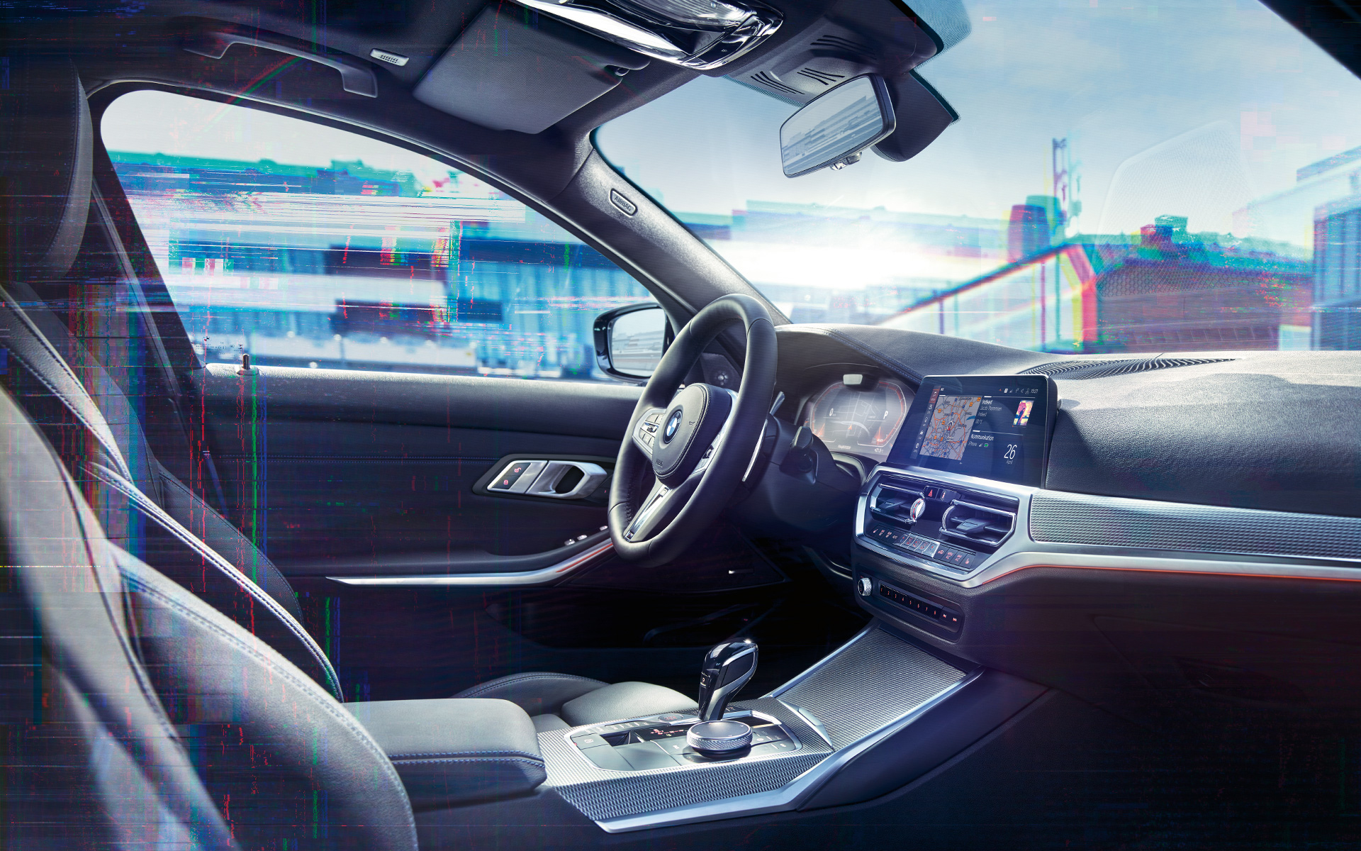 BMW 3 Reeks Berline (G20), BMW Live Cockpit Navigation Professional. Close-up van het interieur van de BMW 3 Reeks Berline (G20) met BMW Live Cockpit Navigation Professional.