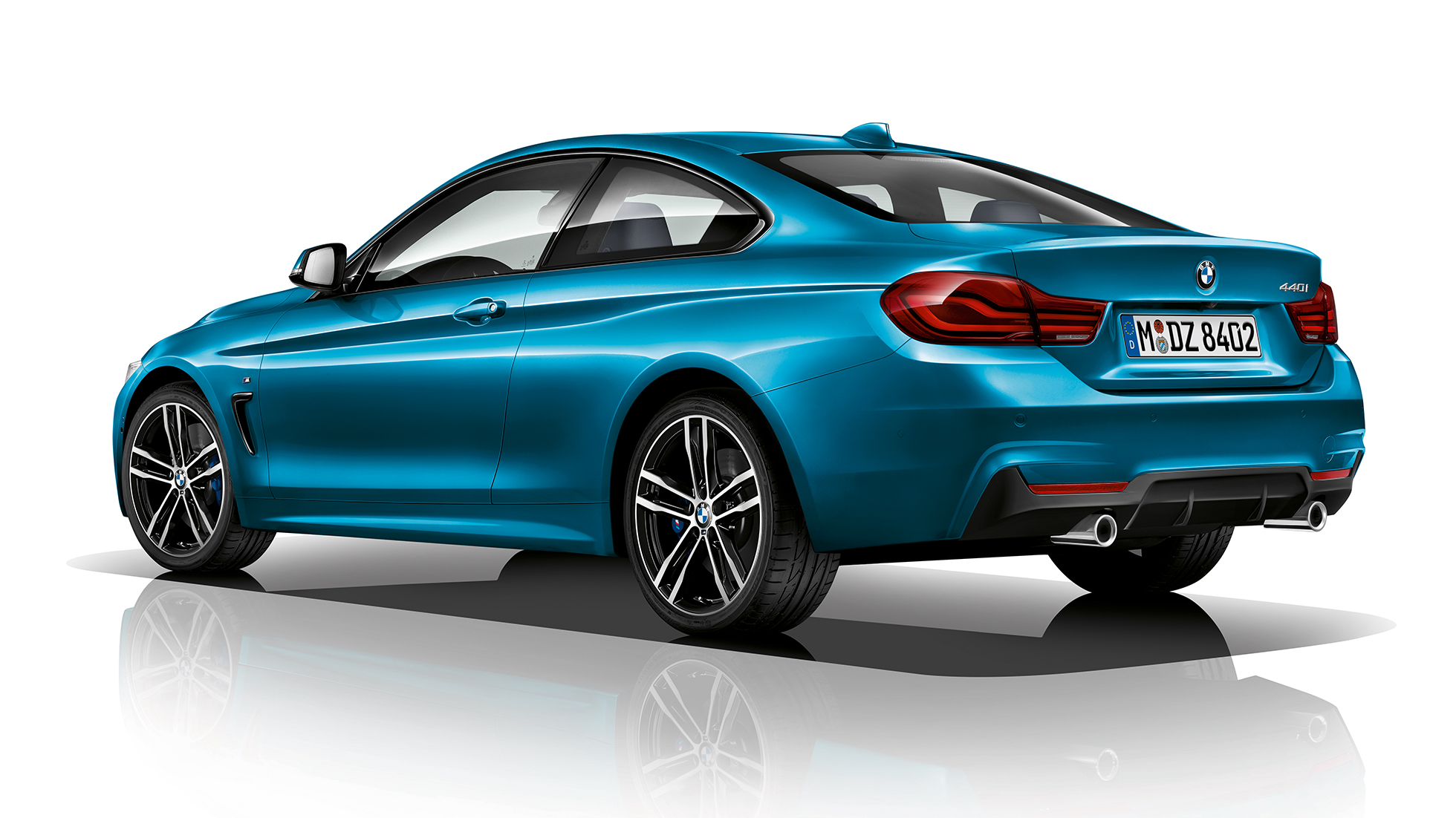 BMW 4 Reeks Coupé, Model M Sport driekwart achteraanzicht BMW 4 Reeks Coupé, Model M Sport driekwart achteraanzicht