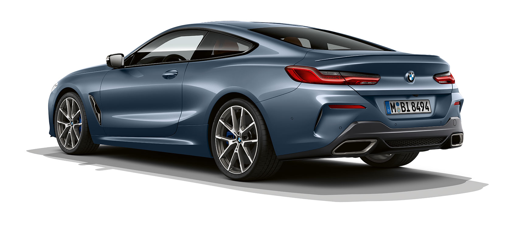 BMW 8 Reeks Coupé, Barcelona Blau metallic G15. BMW 8 Reeks Coupé, Barcelona Blau metallic, driekwart achteraanzicht G15.