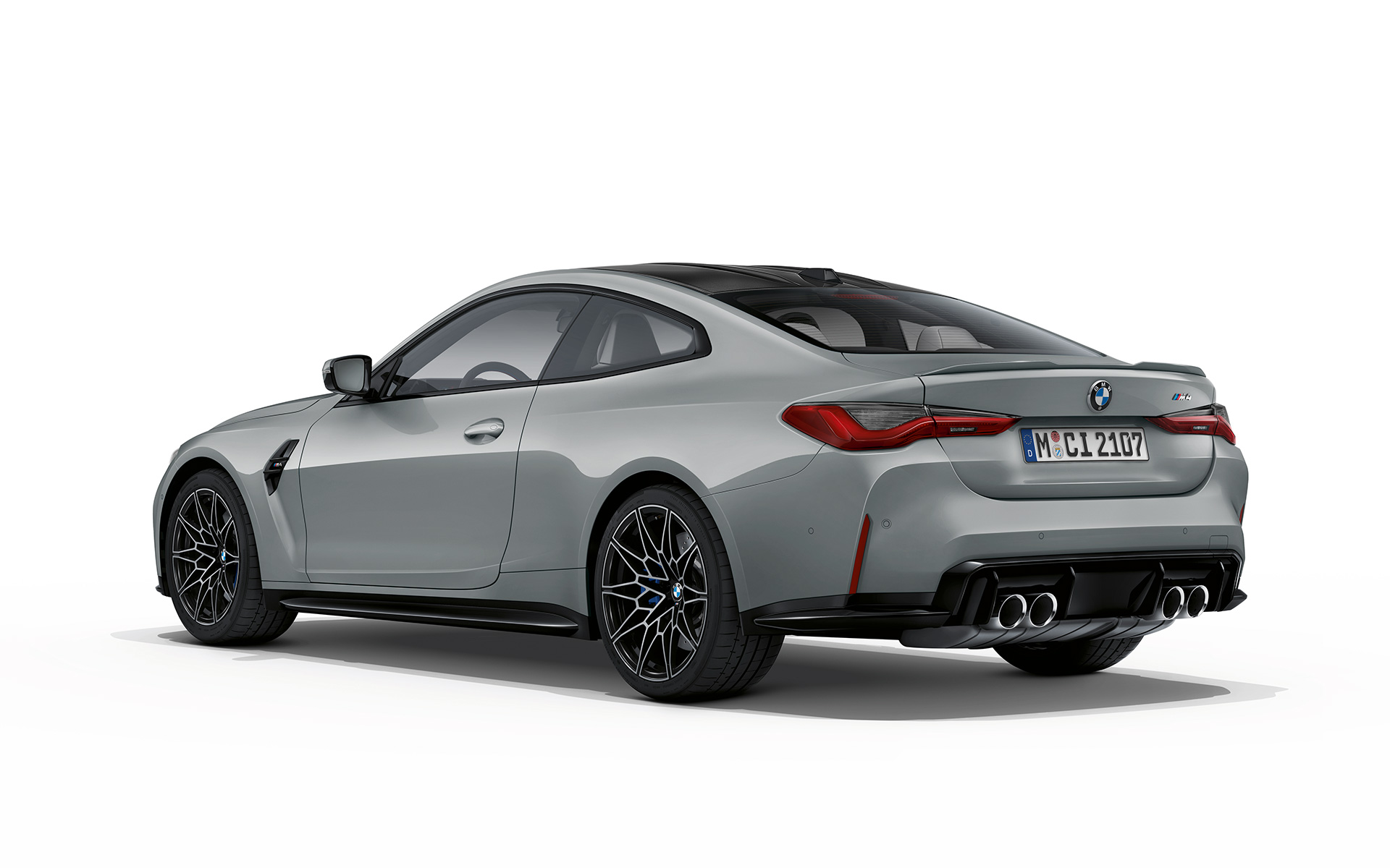 BMW M4 Coupé G82 2020 Brooklyn Grau metallic driekwart achteraanzicht