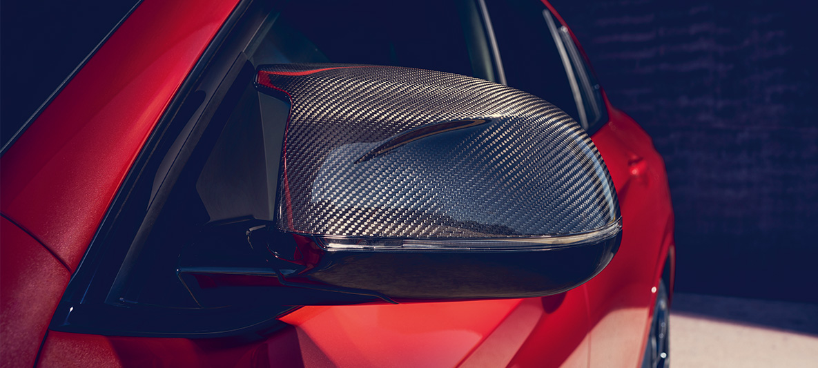 BMW X4 M Competition, coques des rétroviseurs en carbone F98. Extérieur de la BMW X4 M Competition en Toronto Rot metallic, pack extérieur M Carbon, coques des rétroviseurs en carbone F98.