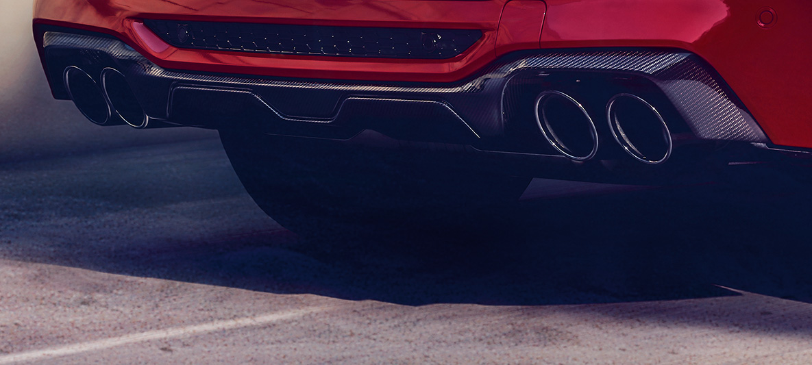 BMW X4 M Competition, diffuseur arrière en carbone F98. Extérieur de la BMW X4 M Competition en Toronto Rot metallic, pack extérieur M Carbon, diffuseur arrière en carbone F98.