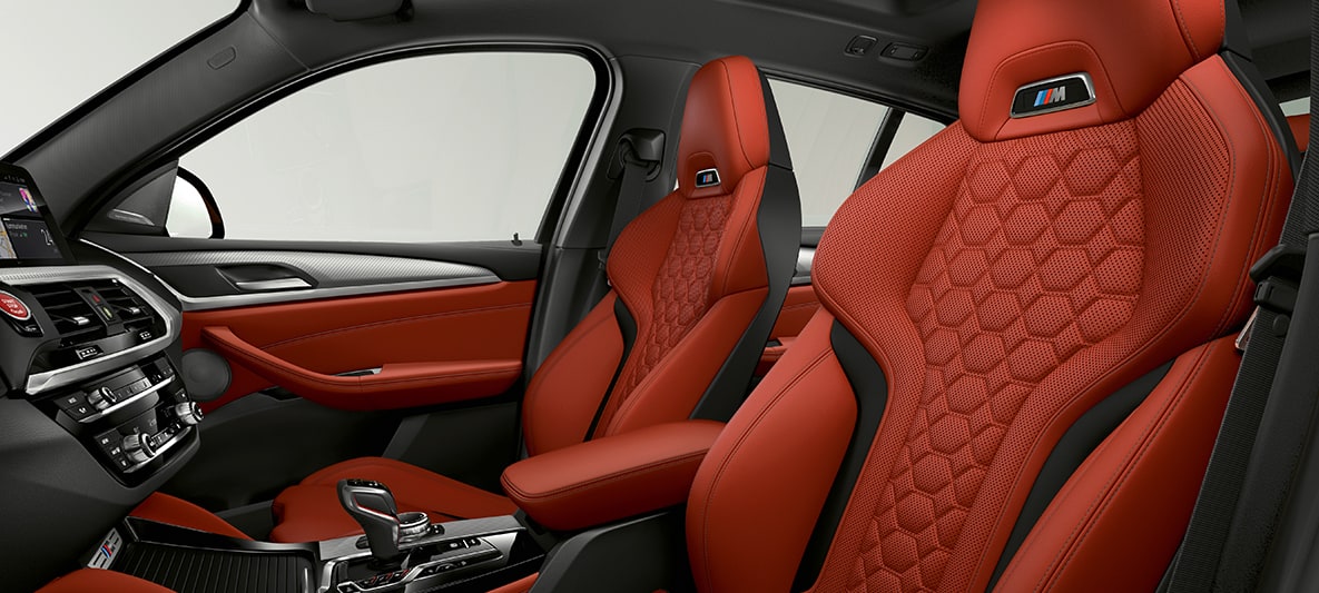 BMW X4 M, sièges sport en cuir Merino Sakhir Orange F98. Intérieur de la BMW X4 M, sièges sport en cuir Merino Sakhir Orange F98.