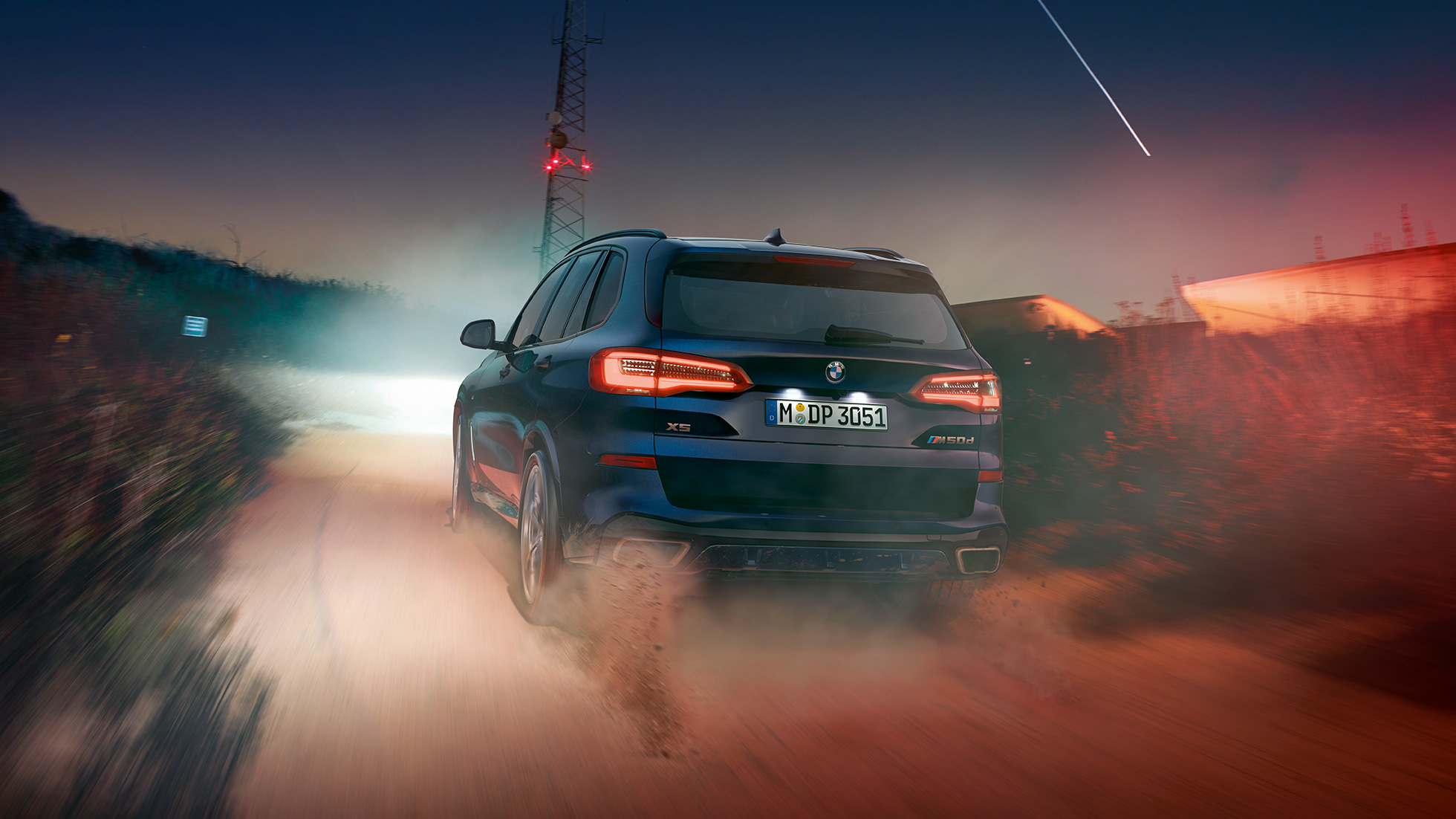 BMW X5 M50d SUV met M TwinPower Turbo 6-cilinder dieselmotor BMW X5 M50d SUV met M TwinPower Turbo 6-cilinder dieselmotor G05 Carbonschwarz metallic achteraanzicht