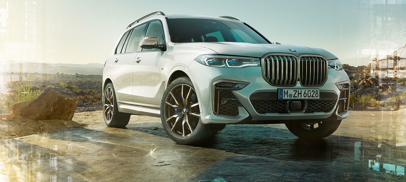 BMW X7 M G07 2019, vue de trois quarts avant BMW X7 M G07 2019 Mineralweiß vue de trois quarts avant à l’arrêt