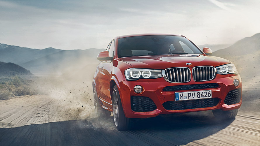 BMW X4 F26 eerste generatie driekwart vooraanzicht rijdend BMW X-modellen BMW X4 F26 eerste generatie driekwart vooraanzicht rijdend