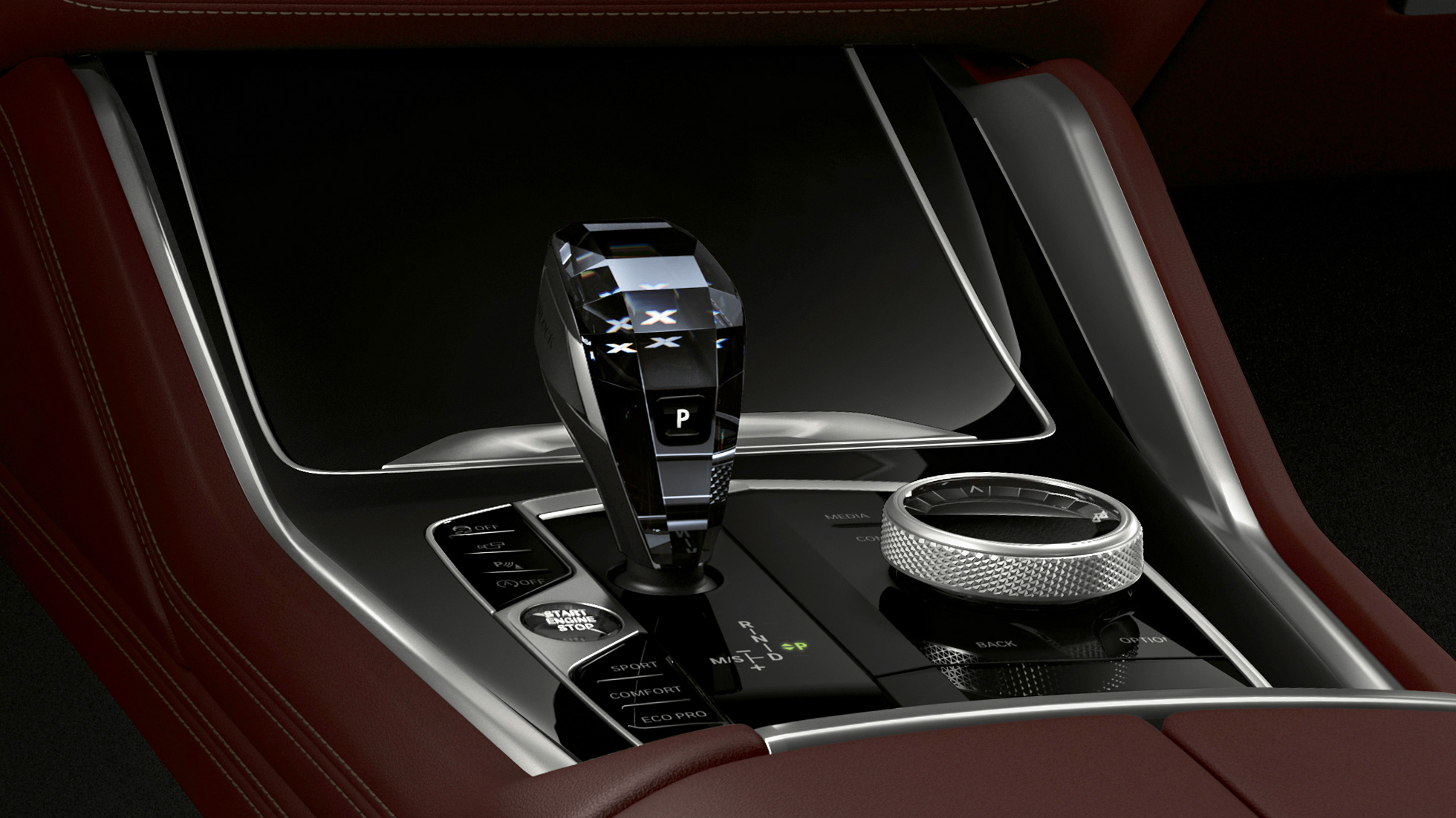 BMW X6 SUV met BMW Individual, middenconsole G06. BMW X6 SUV interieur met BMW Individual met focus op de middenconsole G06.