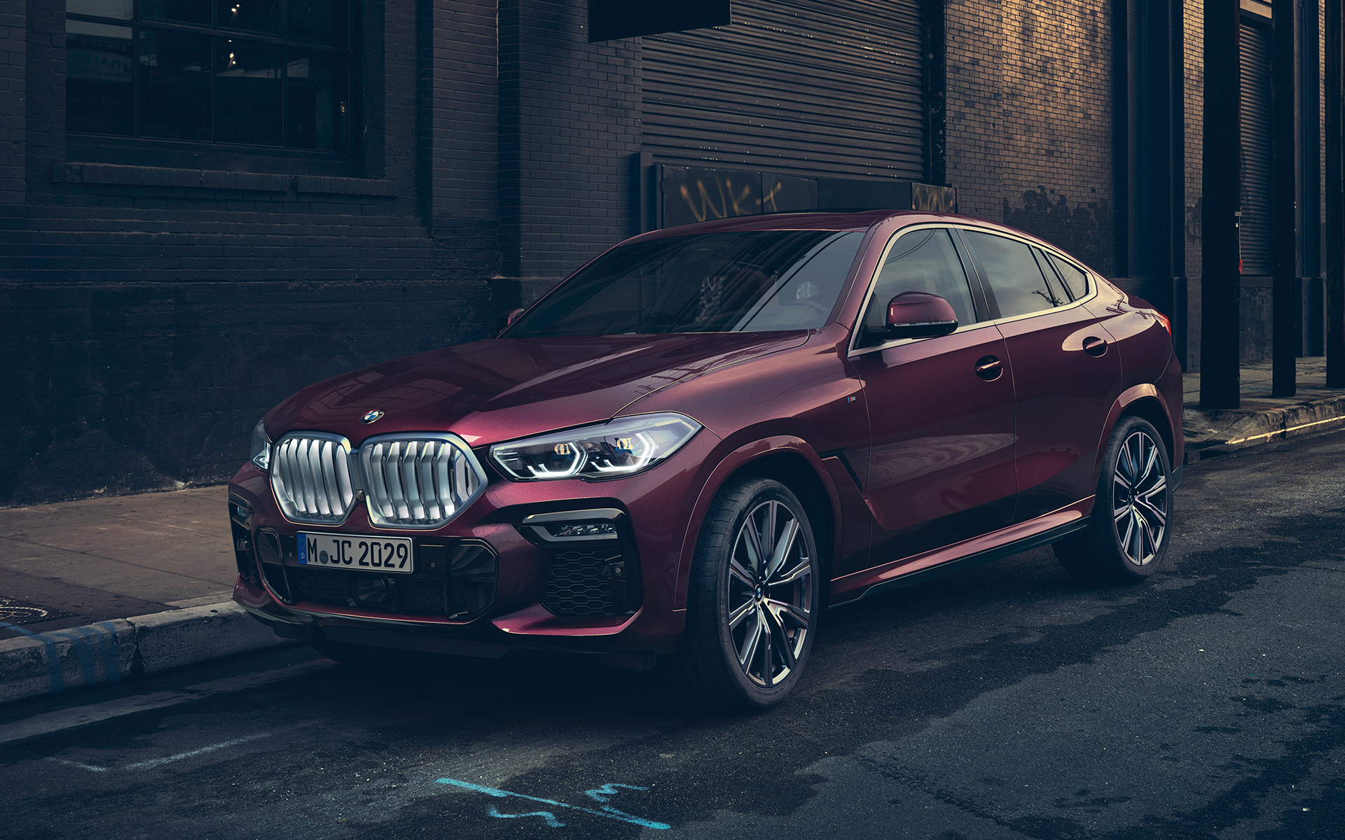 Driekwart vooraanzicht BMW X6 Individual G06 2019 BMW X6 Individual G06 2019 Ametrin metallic driekwart vooraanzicht