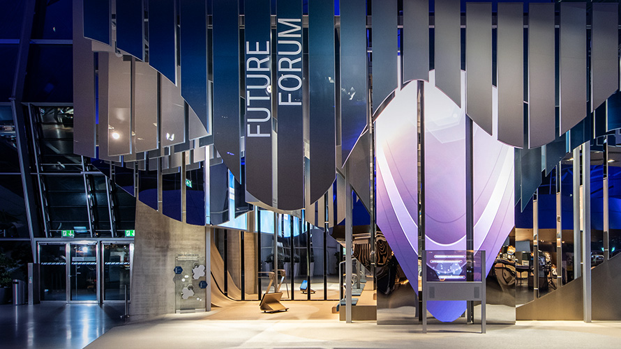 Communication avec les parties prenantes BMW Special Sales Sustainability Hub Governance BMW Special Sales Sustainability Hub Governance Communication avec les parties prenantes, bâtiment avec le logo FUTURE FORUM