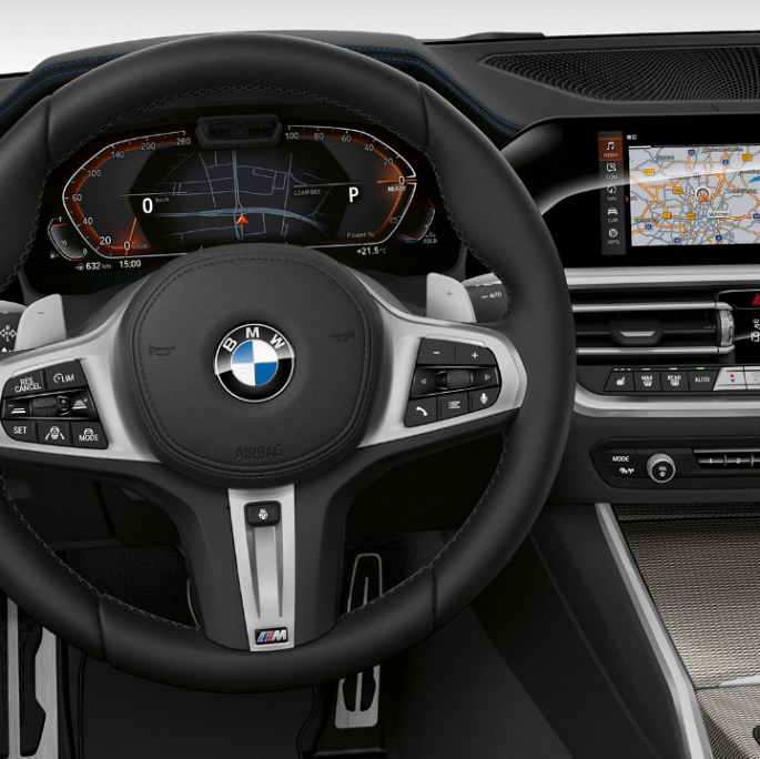 BMW Série 3 Berline, poste de conduite du Modèle Sport Gros plan de face du poste de conduite côté conducteur de la BMW Série 3 Berline, dotée de l’équipement du Modèle Sport.